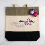 Xeebill hand-embroidered canvas tote bag with geometric cross-stitch and color block design